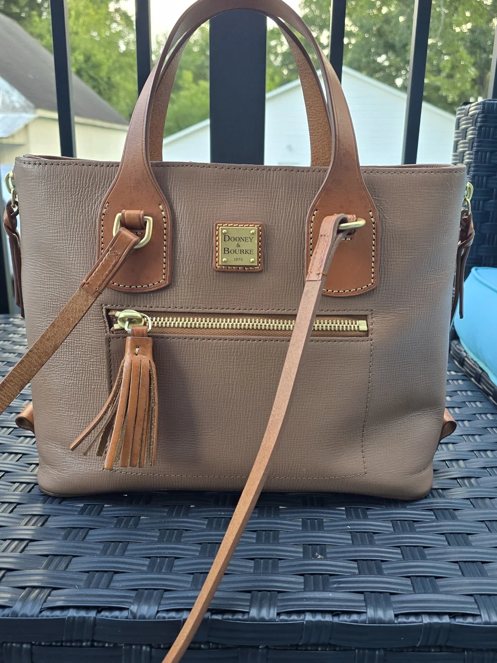 Dooney & Bourke Brown Leather Tote with Tan Trim and Tassel